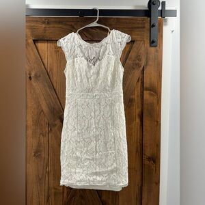 Nikibiki Size Large off white dress. Worn once.